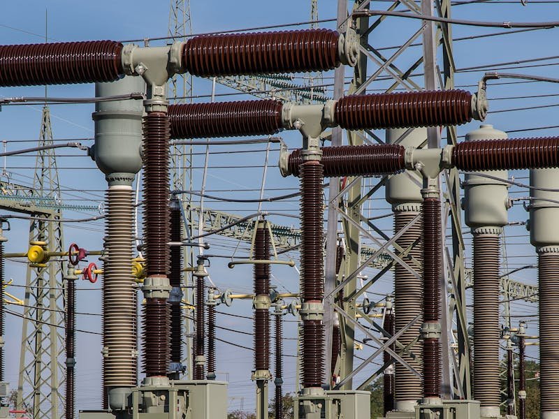 Silhouette of trees near power lines at sunset in a Huntsville Alabama neighborhood